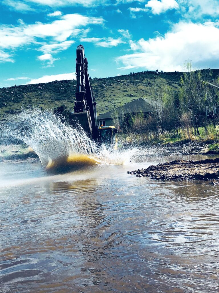 Foundation excavation by CJB's Excavation Colorado, ensuring depth and dimension accuracy.