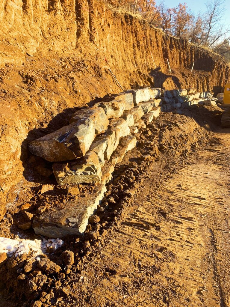 CJB's Excavation Colorado handling steep slope excavation with advanced techniques.