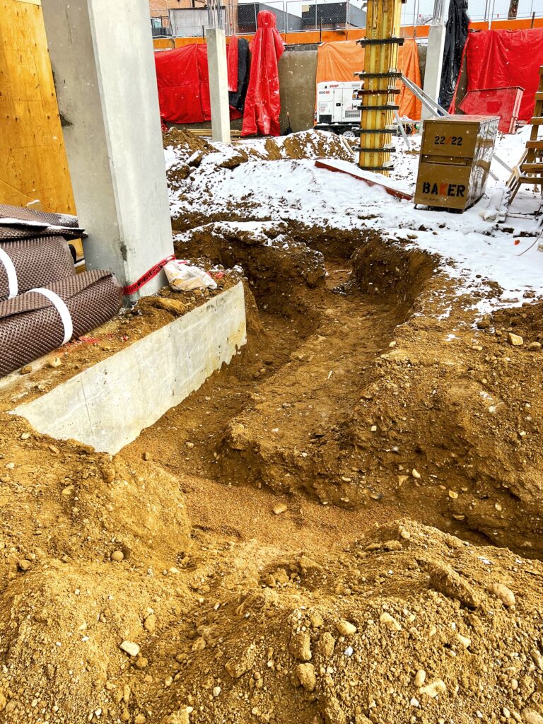 Reliable drainage trench digging by CJB's Excavation Colorado to prevent flooding.